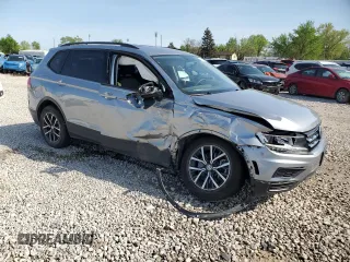 2021 Volkswagen Tiguan S with VIN 3VV1B7AX7MM133023, listed as a Copart auction lot 55229545 with 57,228 mi miles and Salvage title. Bid and sale history available at DreamBid. Image 4.