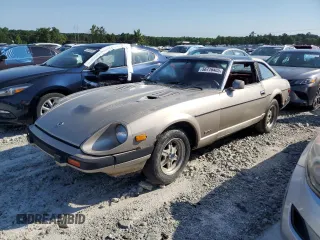 1983 Datsun 280ZX 2+2 z VIN JN1HZ06S1DX500976, wystawiony jako Copart lot #56716405 z przebiegiem 190 889 mil mil oraz Czysty tytuł • Clean title. Historia ofert i sprzedaży dostępna na DreamBid. Obrazek 1.