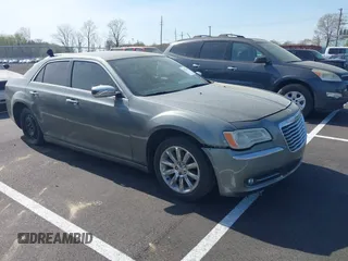 2012 Chrysler 300 Limited with VIN 2C3CCACG9CH199587, listed as a IAAI auction lot 41912142 with 158,065 mi miles. Bid and sale history available at carsss.com. Image 1.