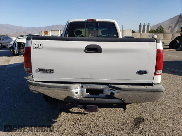 2002 Ford F-250 XL with VIN 1FTNX20L32ED10043, listed as a Copart auction lot 82608574 with 150,324 mi miles and Salvage title. Bid and sale history available at DreamBid. Image 6.