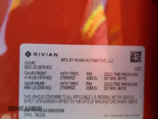 2024 Rivian R1T Adventure z VIN 7FCTGCAA3RN030346, wystawiony jako Copart lot #49440515 z przebiegiem 12 772 mil mil oraz Szkoda całkowita • Salvage title. Historia ofert i sprzedaży dostępna na DreamBid. Obrazek 13.