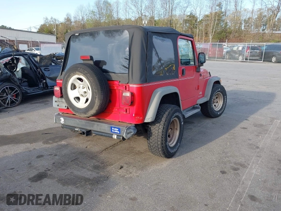2003 Jeep Wrangler Sport with VIN 1J4FA49S13P320159, listed as a IAAI auction lot 41935699 with 212,355 mi miles. Bid and sale history available at carsss.com. Image 4.