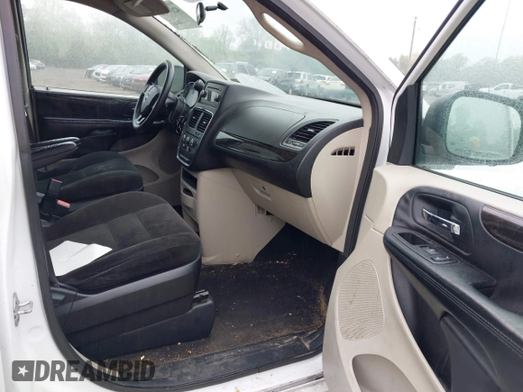 2015 Dodge Grand Caravan SE with VIN 2C4RDGBG2FR606610, listed as a IAAI auction lot 42197738 with 144,620 mi miles and . Bid and sale history available at DreamBid. Image 5.
