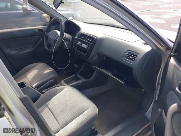 1999 Honda Civic VP with VIN 2HGEJ6615XH528453, listed as a IAAI auction lot 41655363 with 163,816 mi miles. Bid and sale history available at carsss.com. Image 5.