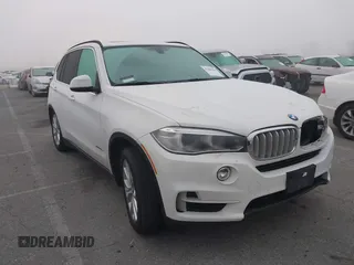 2016 BMW X5 xDrive40e with VIN 5UXKT0C59G0S79593, listed as a IAAI auction lot 41846666 with 57,178 mi miles and . Bid and sale history available at DreamBid. Image 13.