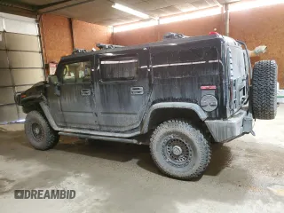 2006 Hummer H2 with VIN 5GRGN23U06H111389, listed as a Copart auction lot 88747715 with 182,628 mi miles and Salvage Title. Bid and sale history available at carsss.com. Image 2.
