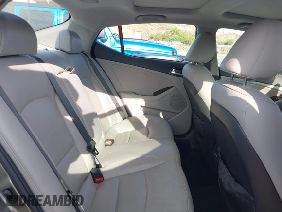 2013 Kia Optima EX z VIN 5XXGN4A70DG252497, wystawiony jako IAAI lot #42145025 z przebiegiem 90 867 mil mil oraz . Historia ofert i sprzedaży dostępna na DreamBid. Obrazek 8.