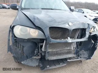 2009 BMW X5 30i with VIN 5UXFE43579L037535, listed as a IAAI auction lot 41715317 with 210,697 mi miles. Bid and sale history available at carsss.com. Image 18.