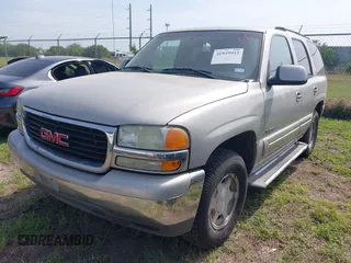 2004 GMC Yukon SLE z VIN 1GKEC13V94R293218, wystawiony jako IAAI lot #41939912 z przebiegiem 336 393 mil mil oraz . Historia ofert i sprzedaży dostępna na DreamBid. Obrazek 6.
