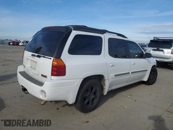 2003 GMC Envoy XL SLE with VIN 1GKET16S532130221, listed as a Copart auction lot 87108784 with 217,821 mi miles and Salvage Title. Bid and sale history available at carsss.com. Image 3.