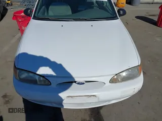 1999 Ford Escort LX with VIN 1FAFP10P7XW216711, listed as a IAAI auction lot 41851068 with 70,499 mi miles. Bid and sale history available at carsss.com. Image 6.