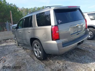 2017 Chevrolet Tahoe LS with VIN 1GNSCAKC7HR179715, listed as a IAAI auction lot 40948996 with 164,178 mi miles. Bid and sale history available at carsss.com. Image 3.