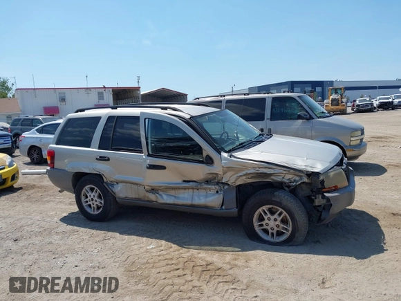2004 Jeep Grand Cherokee Laredo z VIN 1J4GW48SX4C283922, wystawiony jako IAAI lot #42306869 z przebiegiem 263 812 mil mil oraz . Historia ofert i sprzedaży dostępna na DreamBid. Obrazek 12.