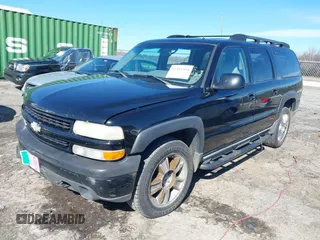 2002 Chevrolet Suburban LT with VIN 3GNFK16Z52G264577, listed as a IAAI auction lot 41881062 with 321,321 mi miles. Bid and sale history available at carsss.com. Image 2.