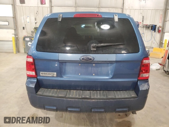 2009 Ford Escape XLS with VIN 1FMCU02769KC80094, listed as a Copart auction lot 50651005 with 205,247 mi miles and Salvage title. Bid and sale history available at DreamBid. Image 6.