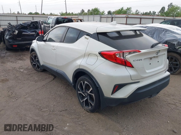 2018 Toyota C-HR XLE z VIN JTNKHMBX4J1001128, wystawiony jako IAAI lot #41957363 z przebiegiem 108 233 mil mil oraz . Historia ofert i sprzedaży dostępna na DreamBid. Obrazek 3.