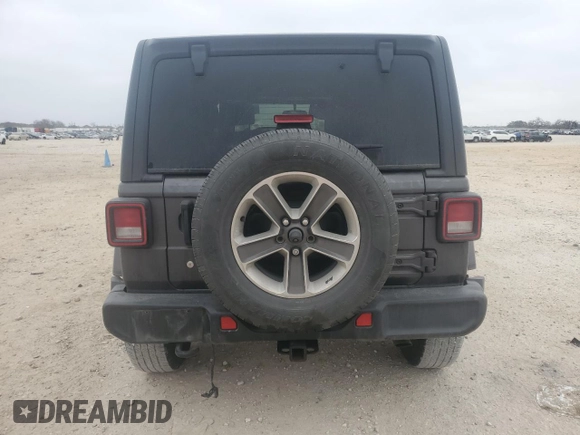 2020 Jeep Wrangler Unlimited Sahara with VIN 1C4HJXENXLW148140, listed as a Copart auction lot 43897435 with 104,411 mi miles and Salvage Title. Bid and sale history available at carsss.com. Image 6.