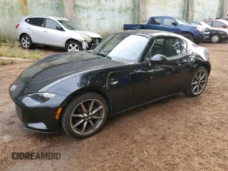 2023 Mazda MX-5 Miata Grand Touring z VIN JM1NDAM76P0551177, wystawiony jako Copart lot #46320214 z przebiegiem 2 803 mil mil oraz Czysty tytuł • Clean title. Historia ofert i sprzedaży dostępna na DreamBid. Obrazek 1.