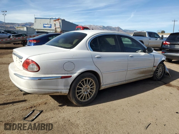 2007 Jaguar X-Type z VIN SAJWA51A07WJ14424, wystawiony jako Copart lot #84556864 z przebiegiem Nie podano mil oraz Szkody całkowita. Historia ofert i sprzedaży dostępna na DreamBid. Obrazek 3.