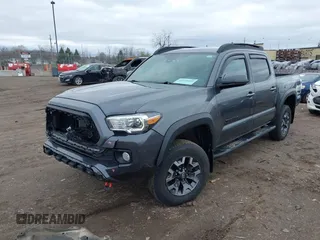 2021 Toyota Tacoma 4WD SR with VIN 3TMCZ5AN2MM406293, listed as a IAAI auction lot 41925585 with 52,243 mi miles. Bid and sale history available at carsss.com. Image 2.