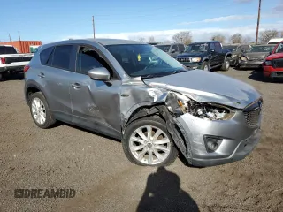 2013 Mazda CX-5 Grand Touring with VIN JM3KE4DE5D0101104, listed as a Copart auction lot 84828824 with 56,453 mi miles and Non Repairable. Bid and sale history available at carsss.com. Image 4.