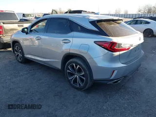 2018 Lexus RX 350 z VIN 2T2ZZMCA6JC096728, wystawiony jako IAAI lot #41356629 z przebiegiem 76 982 mil mil oraz . Historia ofert i sprzedaży dostępna na DreamBid. Obrazek 3.