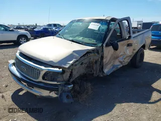 1998 Ford F-150 with VIN 1FTZF1726WKC16774, listed as a IAAI auction lot 41646280 with 142,100 mi miles and . Bid and sale history available at DreamBid. Image 6.