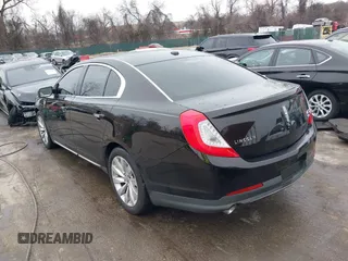 2014 Lincoln MKS with VIN 1LNHL9EK7EG609329, listed as a IAAI auction lot 41555819 with 89,849 mi miles. Bid and sale history available at carsss.com. Image 3.