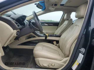2014 Lincoln MKZ with VIN 3LN6L2J97ER817852, listed as a Copart auction lot 60980885 with 77,194 mi miles and Salvage title. Bid and sale history available at DreamBid. Image 7.