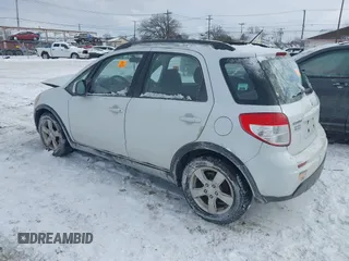 2012 Suzuki SX4 Crossover with VIN JS2YB5A31C6304822, listed as a IAAI auction lot 41366800 with 123,672 mi miles and . Bid and sale history available at DreamBid. Image 3.