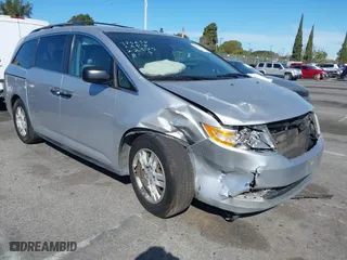 2013 Honda Odyssey LX with VIN 5FNRL5H2XDB065141, listed as a IAAI auction lot 41712328 with 174,020 mi miles. Bid and sale history available at carsss.com. Image 1.