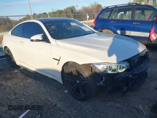 2016 BMW M4 with VIN WBS3R9C5XGK337751, listed as a IAAI auction lot 41484971 with 69,028 mi miles. Bid and sale history available at carsss.com. Image 1.
