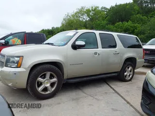 2013 Chevrolet Suburban LT with VIN 1GNSKJE74DR166223, listed as a IAAI auction lot 42172184 with 200,901 mi miles and . Bid and sale history available at DreamBid. Image 14.