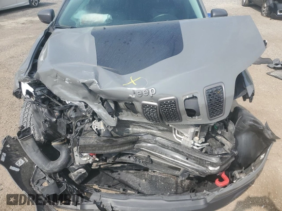 2019 Jeep Cherokee Trailhawk with VIN 1C4PJMBX6KD425554, listed as a Copart auction lot 61097135 with 97,452 mi miles and Salvage title. Bid and sale history available at DreamBid. Image 12.