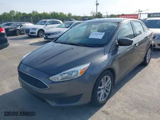 2018 Ford Focus SE with VIN 1FADP3F24JL207231, listed as a IAAI auction lot 42024366 with 134,446 mi miles. Bid and sale history available at carsss.com. Image 18.