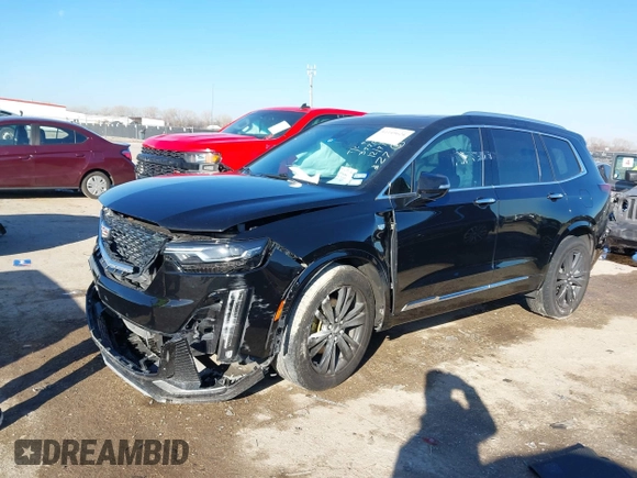 2022 Cadillac XT6 Premium Luxury with VIN 1GYKPCRS1NZ121711, listed as a IAAI auction lot 41149624 with 62,887 mi miles and . Bid and sale history available at DreamBid. Image 2.