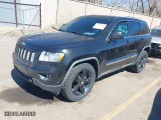 2011 Jeep Grand Cherokee Laredo with VIN 1J4RR4GG0BC656301, listed as a IAAI auction lot 41894106 with 95,293 mi miles. Bid and sale history available at carsss.com. Image 2.