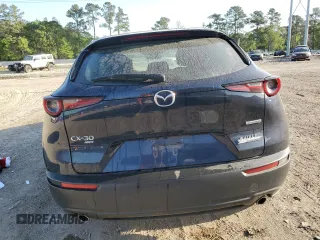 2023 Mazda CX-30 S with VIN 3MVDMBAM1PM566211, listed as a Copart auction lot 52549525 with 36,382 mi miles and Salvage title. Bid and sale history available at DreamBid. Image 6.