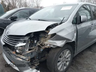 2012 Toyota Sienna XLE with VIN 5TDDK3DC9CS037616, listed as a IAAI auction lot 41435361 with 250,043 mi miles. Bid and sale history available at carsss.com. Image 6.