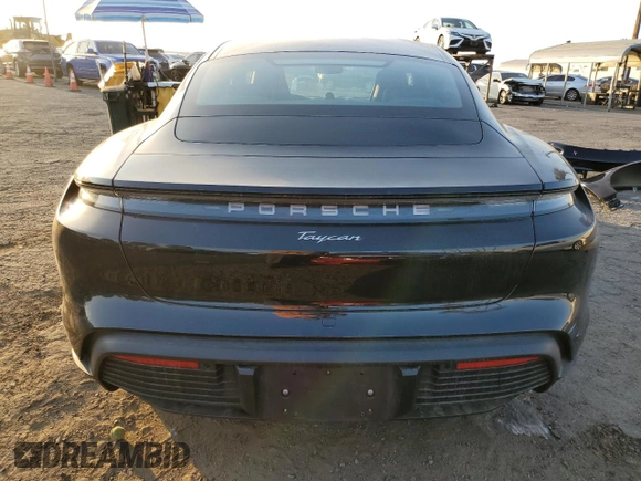 2024 Porsche Taycan with VIN WP0AA2Y10RSA10283, listed as a Copart auction lot 82637484 with 3,036 mi miles and Salvage title. Bid and sale history available at DreamBid. Image 6.