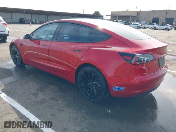2021 Tesla Model 3 Long Range with VIN 5YJ3E1EB2MF015279, listed as a IAAI auction lot 41765428 with 55,486 mi miles. Bid and sale history available at carsss.com. Image 3.