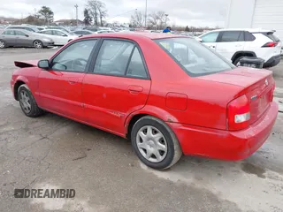 2000 Mazda Protege DX with VIN JM1BJ2224Y0277889, listed as a IAAI auction lot 41160593 with 124,586 mi miles and . Bid and sale history available at DreamBid. Image 3.