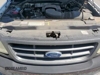 2003 Ford F-150 XL z VIN 2FTPF17ZX3CA65314, wystawiony jako Copart lot #56379215 z przebiegiem 112 475 mil mil oraz Czysty tytuł • Clean title. Historia ofert i sprzedaży dostępna na DreamBid. Obrazek 11.