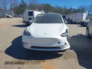 2021 Tesla Model Y Long Range with VIN 5YJYGDEE8MF125104, listed as a IAAI auction lot 41698065 with 25,177 mi miles and . Bid and sale history available at DreamBid. Image 11.