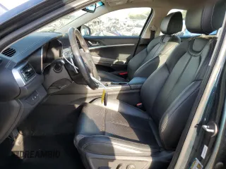 2022 Genesis G70 2.0T with VIN KMTG34TA2NU094241, listed as a Copart auction lot 73439144 with 52,352 mi miles and Salvage Title. Bid and sale history available at carsss.com. Image 7.