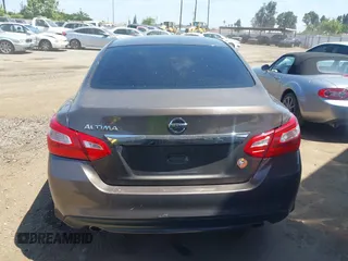 2016 Nissan Altima S z VIN 1N4AL3AP2GN313918, wystawiony jako IAAI lot #42193079 z przebiegiem 111 007 mil mil oraz . Historia ofert i sprzedaży dostępna na DreamBid. Obrazek 17.