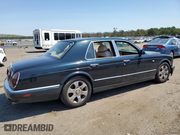 2001 Bentley Arnage with VIN SCBLC31E31CX05992, listed as a Copart auction lot 60462974 with 253,028 mi miles and Salvage Title. Bid and sale history available at DreamBid. Image 3.