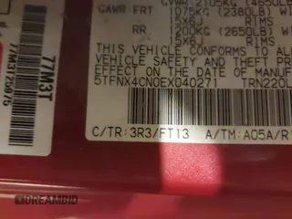2014 Toyota Tacoma with VIN 5TFNX4CN0EX040271, listed as a IAAI auction lot 41548600 with 164,516 mi miles and . Bid and sale history available at DreamBid. Image 9.