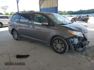 2015 Toyota Sienna XLE с VIN 5TDYK3DC0FS630013, выставлен на аукционе Copart как лот 60044955 с пробегом 124 063 миль миль и Списание • Salvage title. История ставок и продаж доступна на DreamBid. Изображение 4.