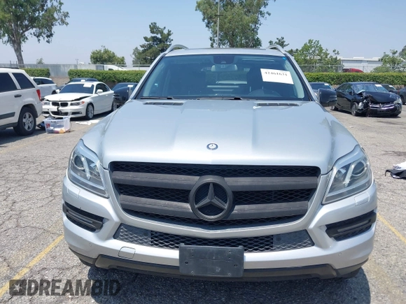 2014 Mercedes-Benz GL 450 z VIN 4JGDF7CE9EA411572, wystawiony jako IAAI lot #42461631 z przebiegiem 121 885 mil mil oraz . Historia ofert i sprzedaży dostępna na DreamBid. Obrazek 12.